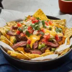 Nachos with Beer Cheese Sauce and Steak